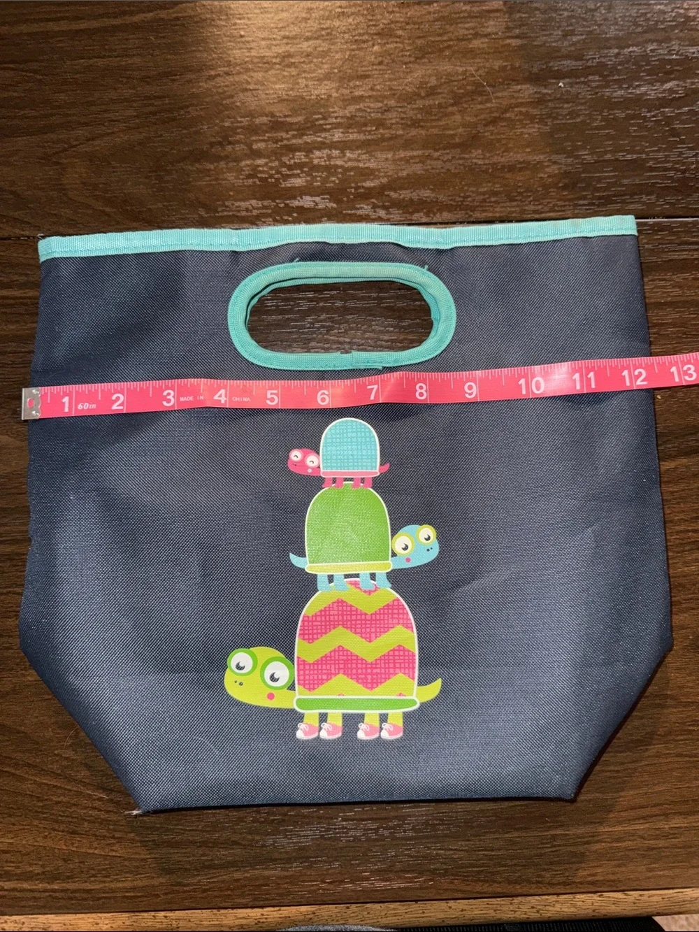 Thirty-One Navy Insulated Lunch Tote with Teal Trim and Colorful Turtle Stack